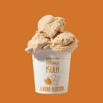 3 scoops of almond blossom kulfi sit atop a white pint container with an almond and blossoms icon on the front
